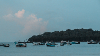 Teal Boats Near Island Teal Boats Near Island