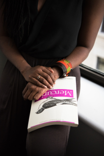 Textbook on Woman's Lap Textbook on Woman's Lap