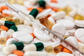 Thermometer on Medical Pills Thermometer on Medical Pills