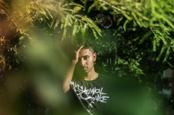 Thinking Man Behind Leaves Thinking Man Behind Leaves