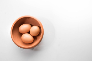 Three Brown Eggs in Bowl Three Brown Eggs in Bowl