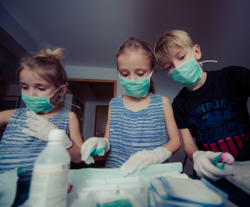 Three Children Wearing Face Masks Three Children Wearing Face Masks