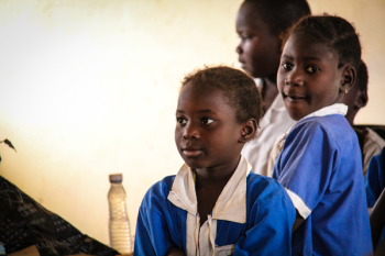 Three Children Wearing School Uniforms Three Children Wearing School Uniforms
