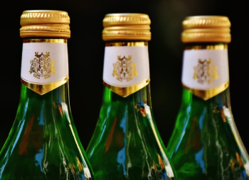 Three Green Glass Bottles Three Green Glass Bottles