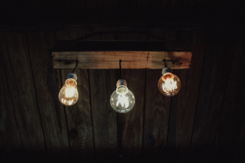 Three Illuminated Lightbulbs 