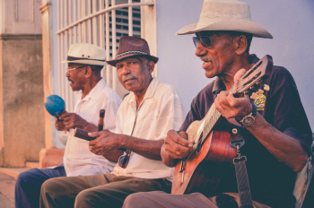Three Men Playing Musical Instruments Three Men Playing Musical Instruments