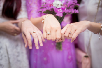 Three Women Showing Solitaire Rings Three Women Showing Solitaire Rings