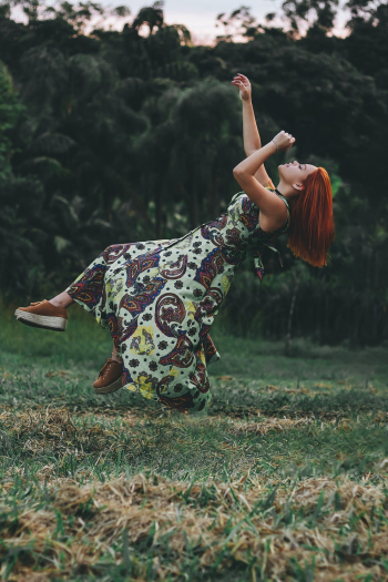 Time Lapse Jumpshot Photography of Woman Jumping on Grass Time Lapse Jumpshot Photography of Woman Jumping on Grass