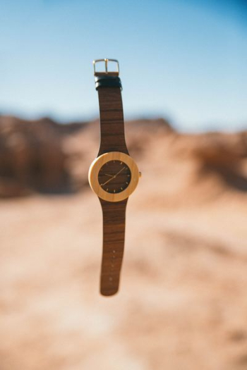 time lapse photography of falling analog watch time lapse photography of falling analog watch