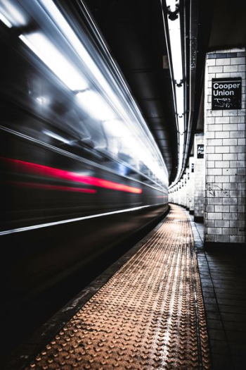 time lapse photography of train in tunnel time lapse photography of train in tunnel