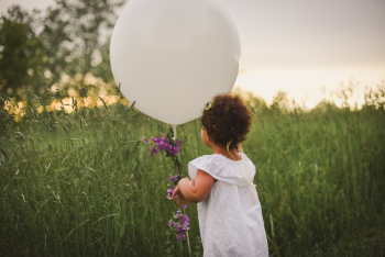 Toddler Holding Balloon Toddler Holding Balloon