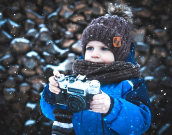 toddler holding camera toddler holding camera