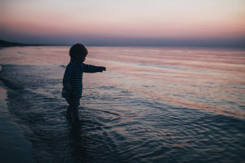 toddler on shore toddler on shore