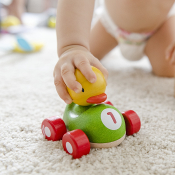 Toddler Playing Duck Toy Toddler Playing Duck Toy
