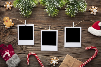 Top view photos on a wooden table with mock-up Free Photo