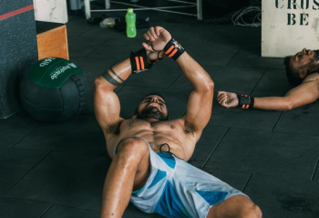 topless man doing exercise topless man doing exercise