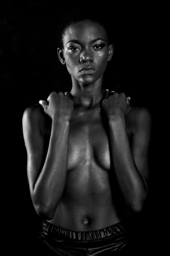 Topless Woman Wearing Black Bottoms Topless Woman Wearing Black Bottoms