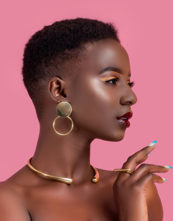 Topless Woman Wearing Gold-colored Choker