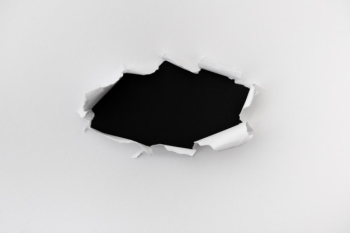 Torn paper with space for text over the black leather background Free Photo