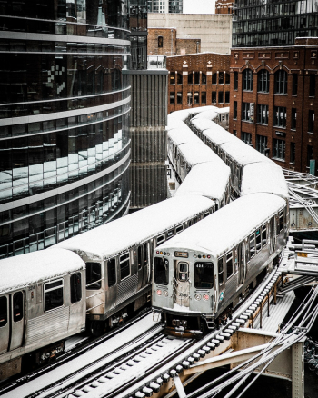 Train Passing by Buildings Train Passing by Buildings
