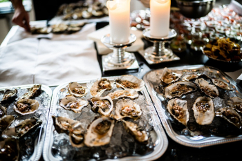 Tray of Oysters on Table Tray of Oysters on Table