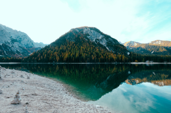 Tree Covered Mountain Near Lake Nature Photography Tree Covered Mountain Near Lake Nature Photography