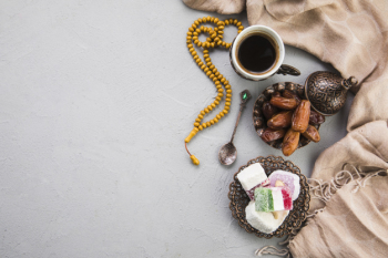 Turkish delight with coffee cup and dates fruit Turkish delight with coffee cup and dates fruit