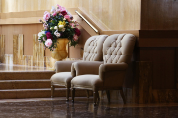 Two Beige Tufted Sofa Chairs Two Beige Tufted Sofa Chairs