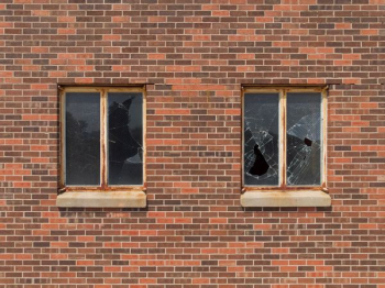 two broken glass building windows two broken glass building windows