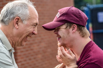 two man laughing at each other two man laughing at each other