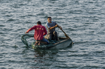 Two Man Riding Boat Photography Two Man Riding Boat Photography