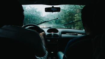 Two Men Inside Moving Vehicle Two Men Inside Moving Vehicle