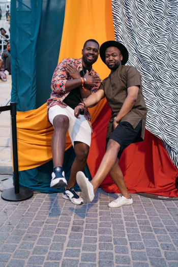 Two Men Raising Their Legs