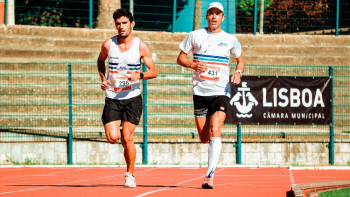 Two Men Running On Track Two Men Running On Track