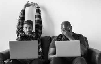 Two men using laptop sitting on sofa | Free stock photo - 392975 Two men using laptop sitting on sofa | Free stock photo - 392975