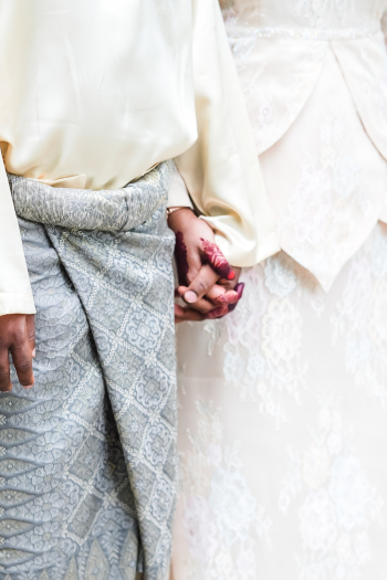 Two People Holding Hands Two People Holding Hands
