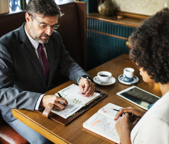 Two People in a Meeting Two People in a Meeting