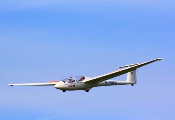 Two People Inside White D-9065 Plane Two People Inside White D-9065 Plane