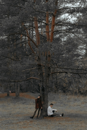Two People Leaning on Tree Two People Leaning on Tree
