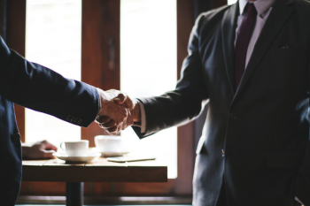 Two People Shaking Hands Two People Shaking Hands
