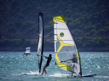 Two People Windsurfing Two People Windsurfing