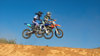 Two Person Riding Motocross Dirt Bikes Two Person Riding Motocross Dirt Bikes