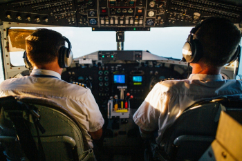 Two Pilots Flying an Airplane Two Pilots Flying an Airplane