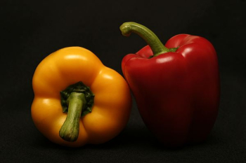 two red and orange bell peppers two red and orange bell peppers