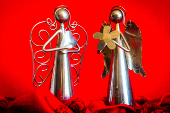 Two Silver Angel Figurines Two Silver Angel Figurines