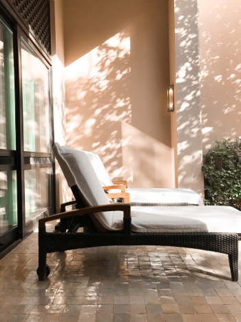 Two White-and-brown Lounge Chairs Two White-and-brown Lounge Chairs
