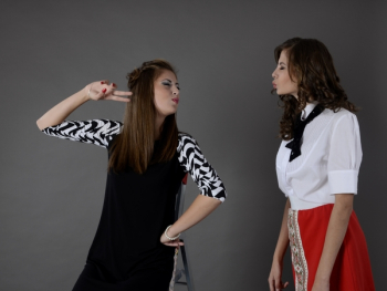 Two Woman Facing Each Other Two Woman Facing Each Other