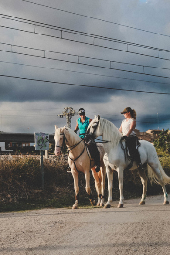 Two Women Riding on Horses Two Women Riding on Horses