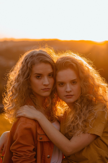 Two Women With Curly Hair Two Women With Curly Hair
