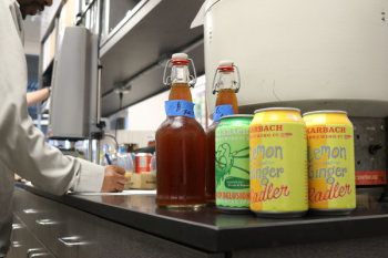Two Yellow Lemon and Ginger Soda Cans Two Yellow Lemon and Ginger Soda Cans